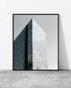 Minimalist architectural print featuring a sleek glass skyscraper with sharp geometric lines in Tokyo.