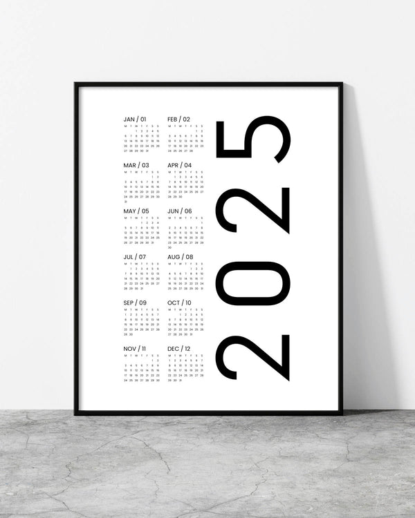 White 2025 wall calendar with bold black numbers in a minimalist grid layout.