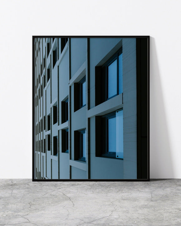 A black-framed photograph capturing the essence of modern architecture in Copenhagen, designed by North Minimal. 